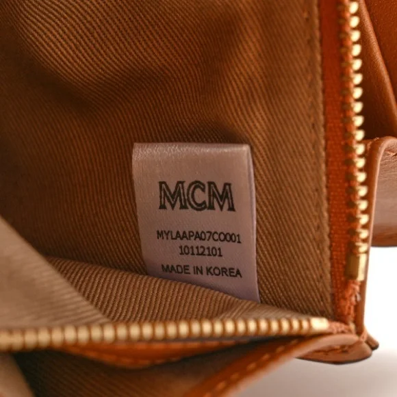 This is an authentic MCM Visetos Millie Wallet On Chain in Cognac. - Picture 5 of 5